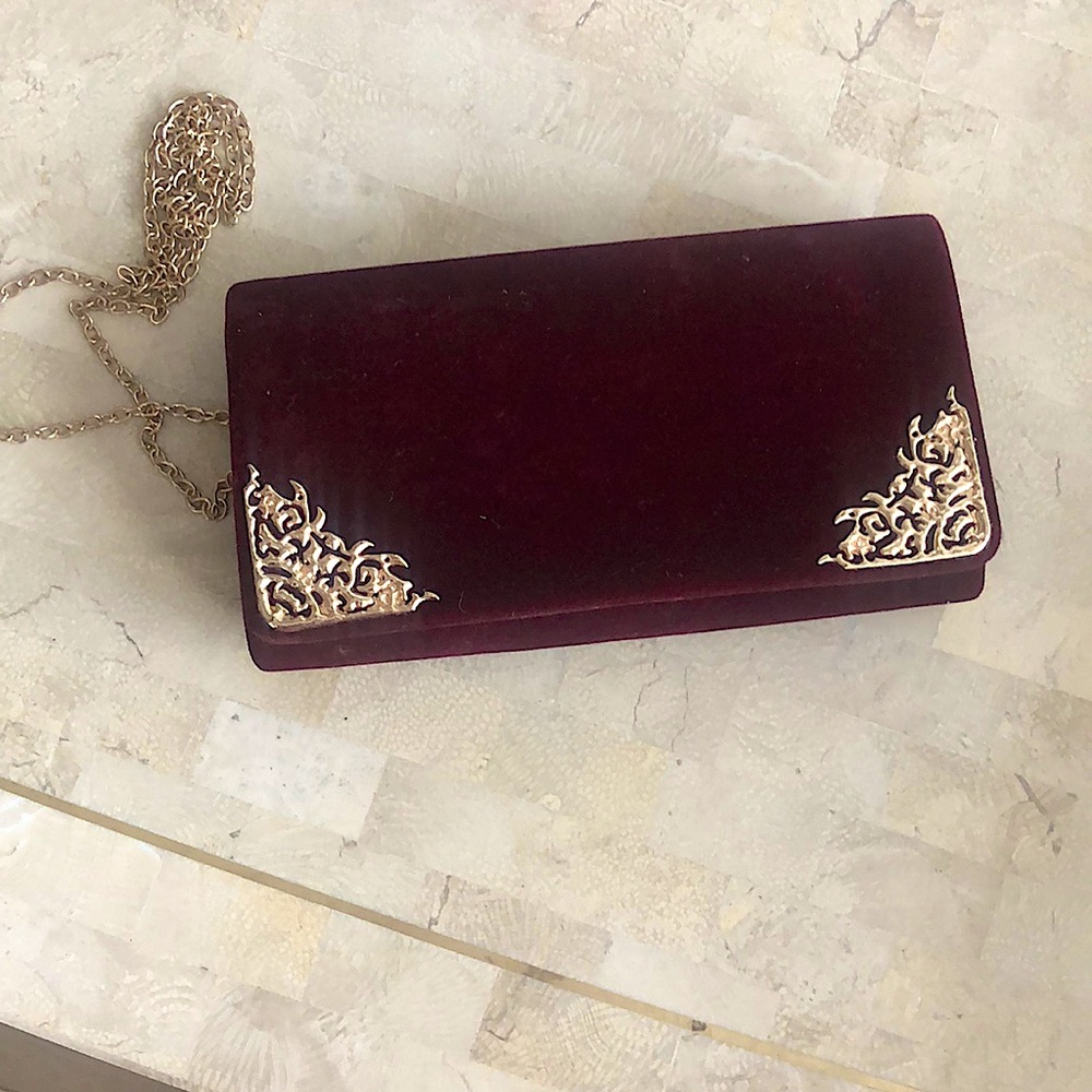 Velvet clutch with gold chain strap